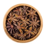 star-anise-seeds-wooden-bowl-over-white-dried-fruits-illicium-verum-also-chinese-badiam-closely-resembles-77562687